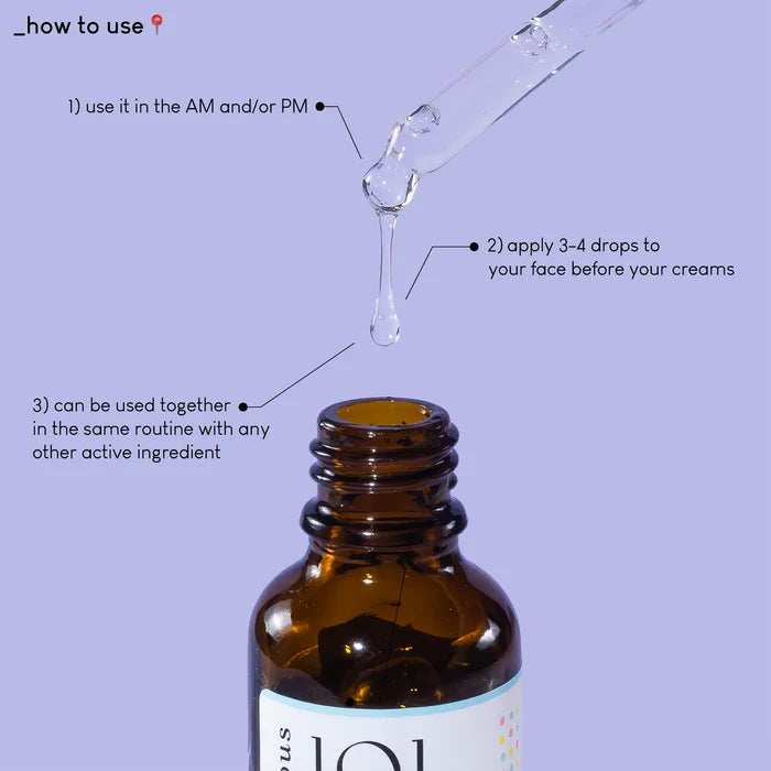 Brown glass dropper bottle with label on a purple background, showing how to use the product - Geek & Gorgeous 101 aPAD