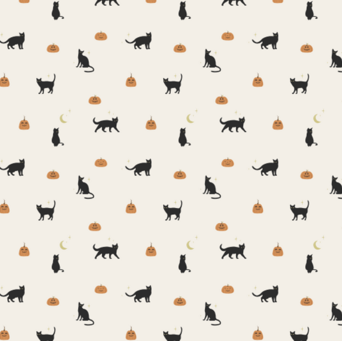 A repeating Halloween-themed pattern featuring black cat silhouettes, orange jack-o'-lanterns, and small yellow crescent moons on a warm cream background.