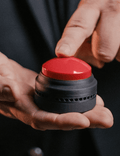 Person holding The Button